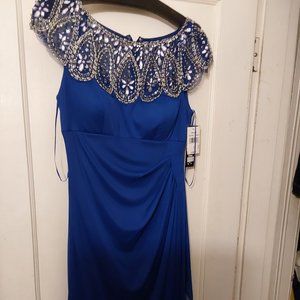 New with tags, royal blue formal dress. Long, ruching,  zippered back, Size 4